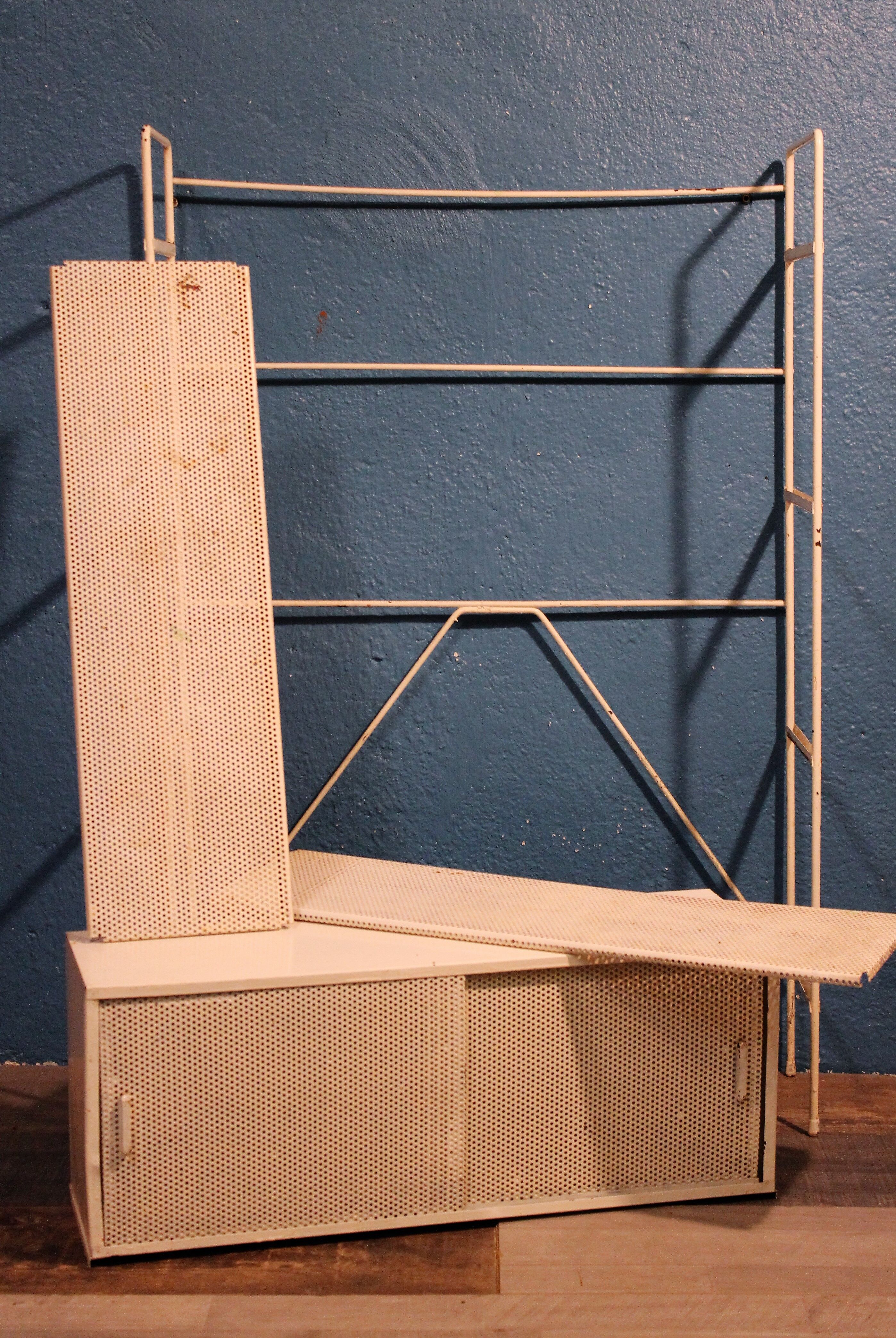 Perforated metal stand 1950