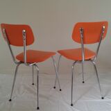 Duo of vintage chairs in orange skai