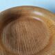 Vintage decor trio: candlestick and light wood bowls in Scandinavian style.