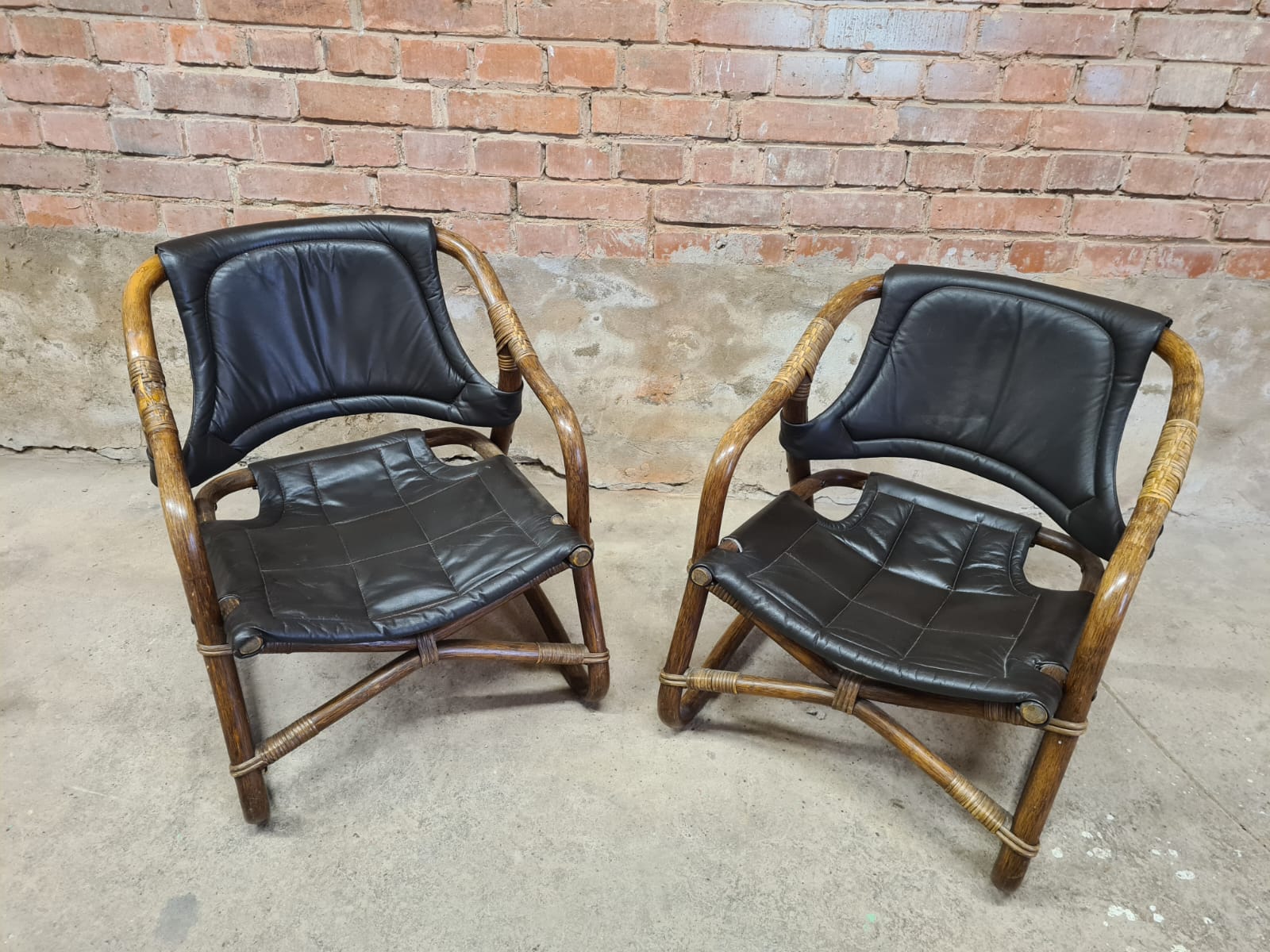 Pair of vintage skaï bamboo armchairs