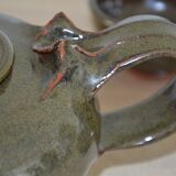 Antique stoneware teapot and its six signed bowls