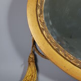 Old bevelled oval mirror with cord and pompoms, 60 x 36 cm