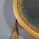 Old bevelled oval mirror with cord and pompoms, 60 x 36 cm