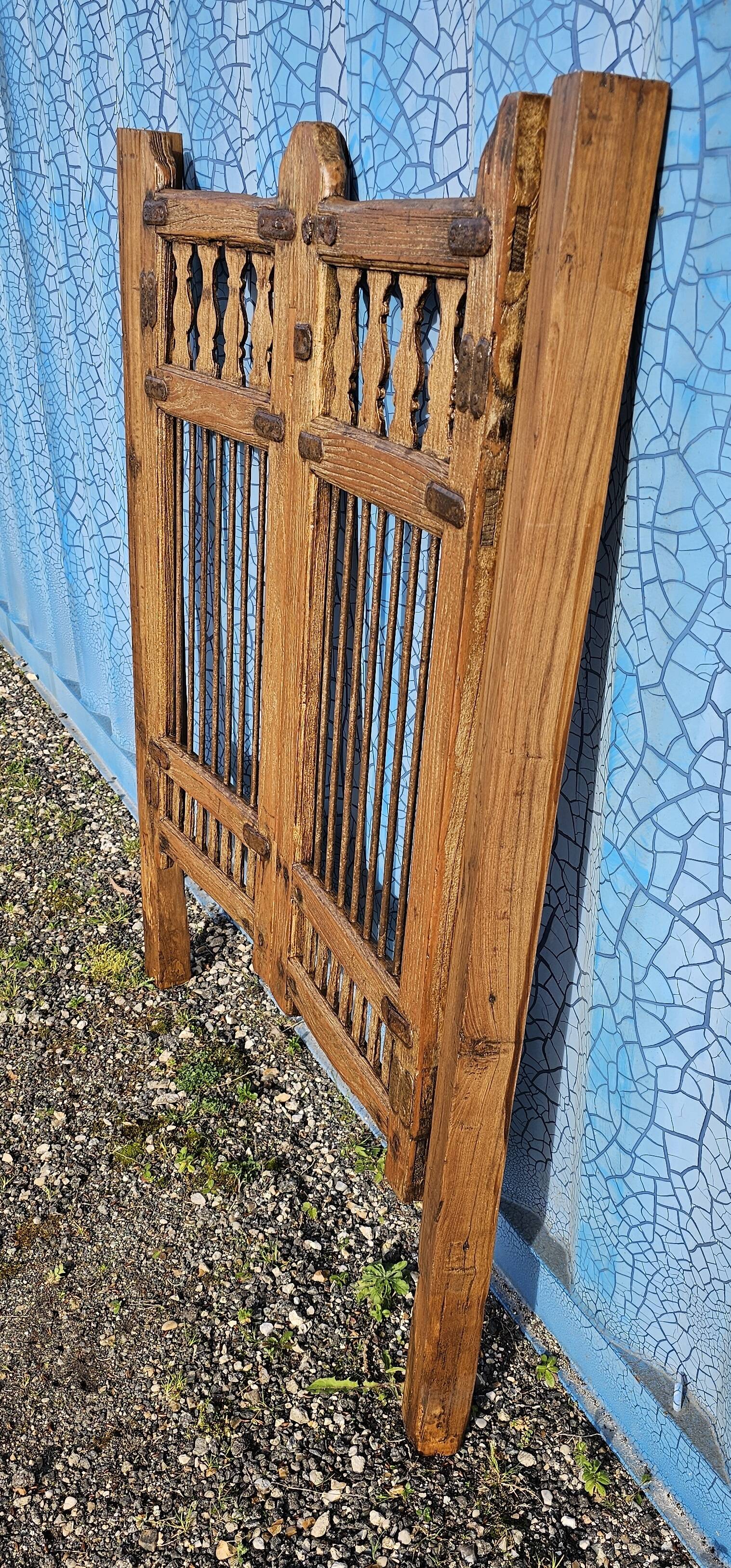 Old garden gate in solid teak