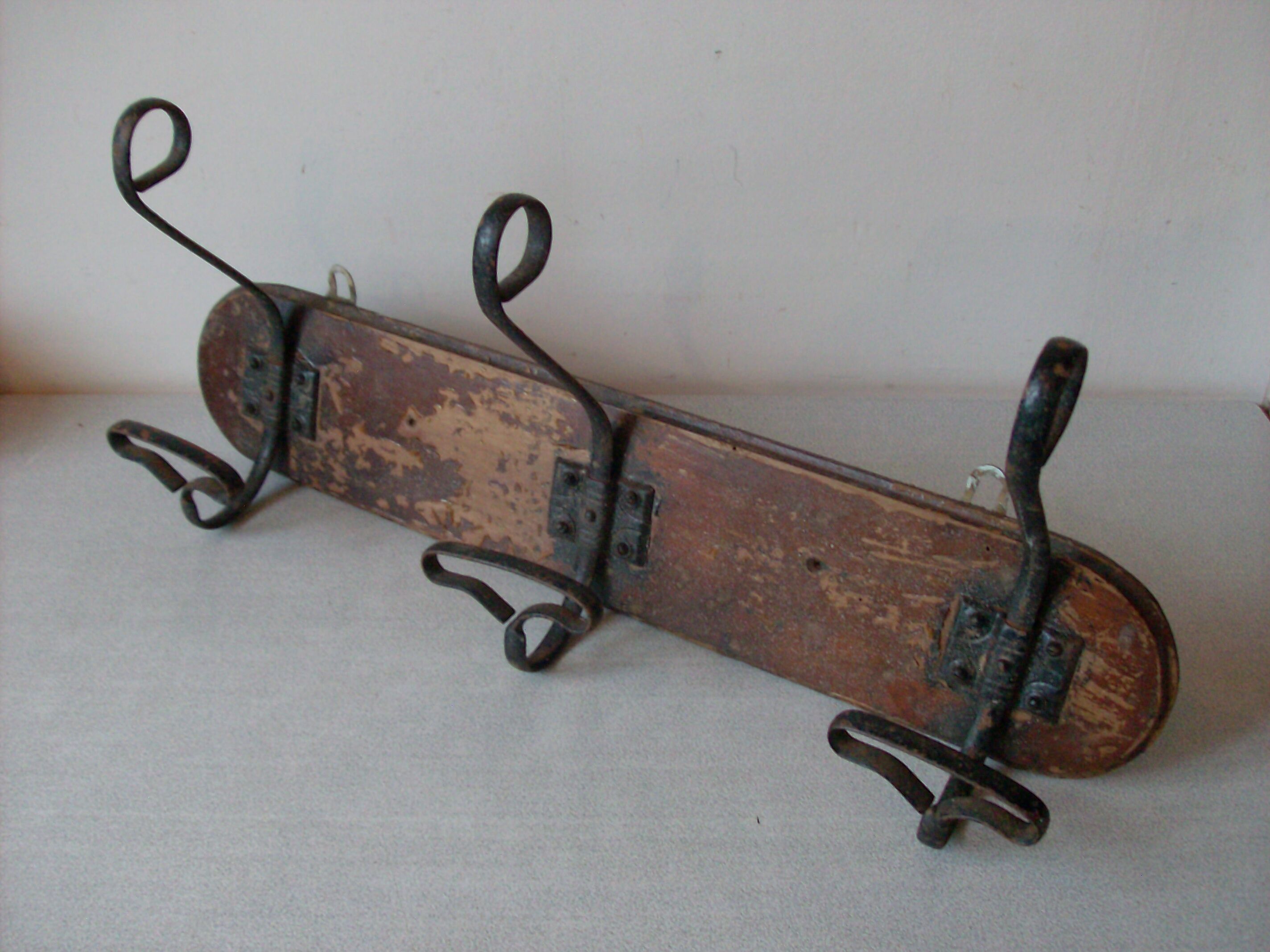 Old wall coat rack 3 metal hooks on wood deco retro entrance hall