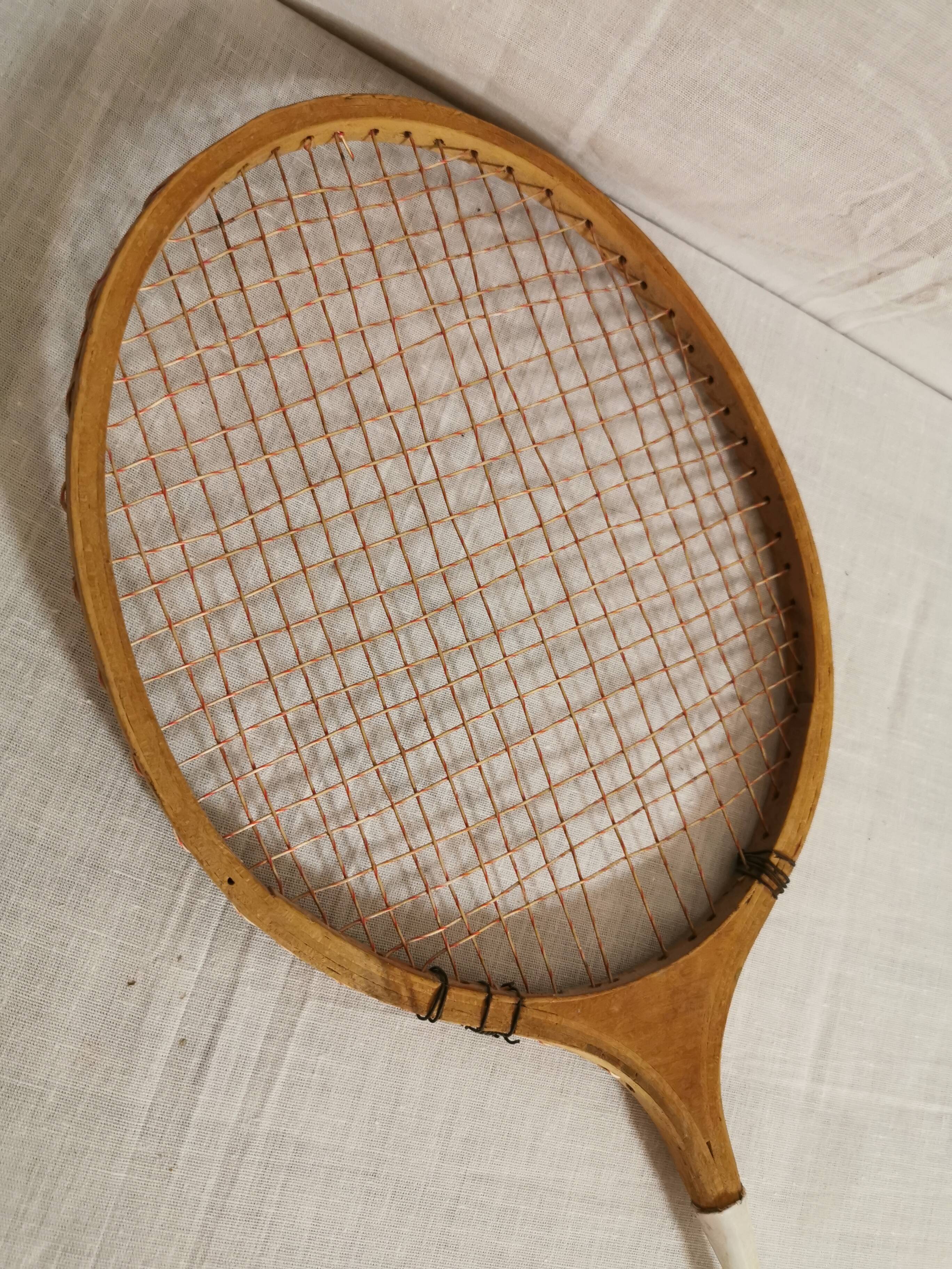 Old tennis racket early 20th in wood