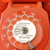 Old orange vintage dial phone
