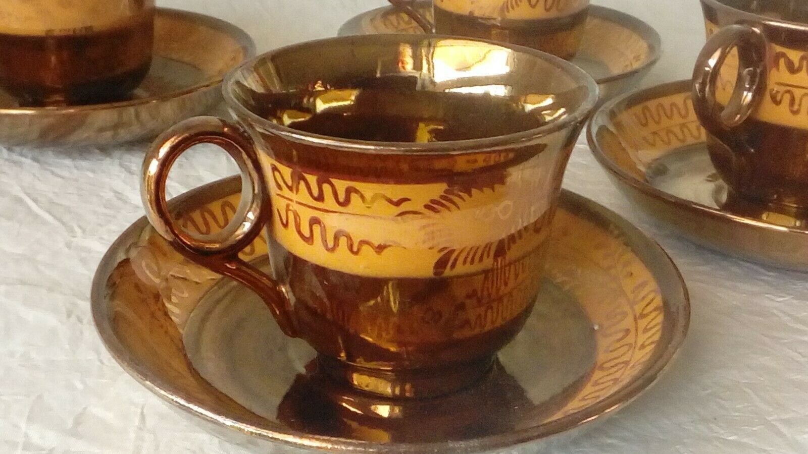 4 cups a cafe and under cups in faience of jersey