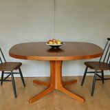 Baumann oval walnut table with extension cords