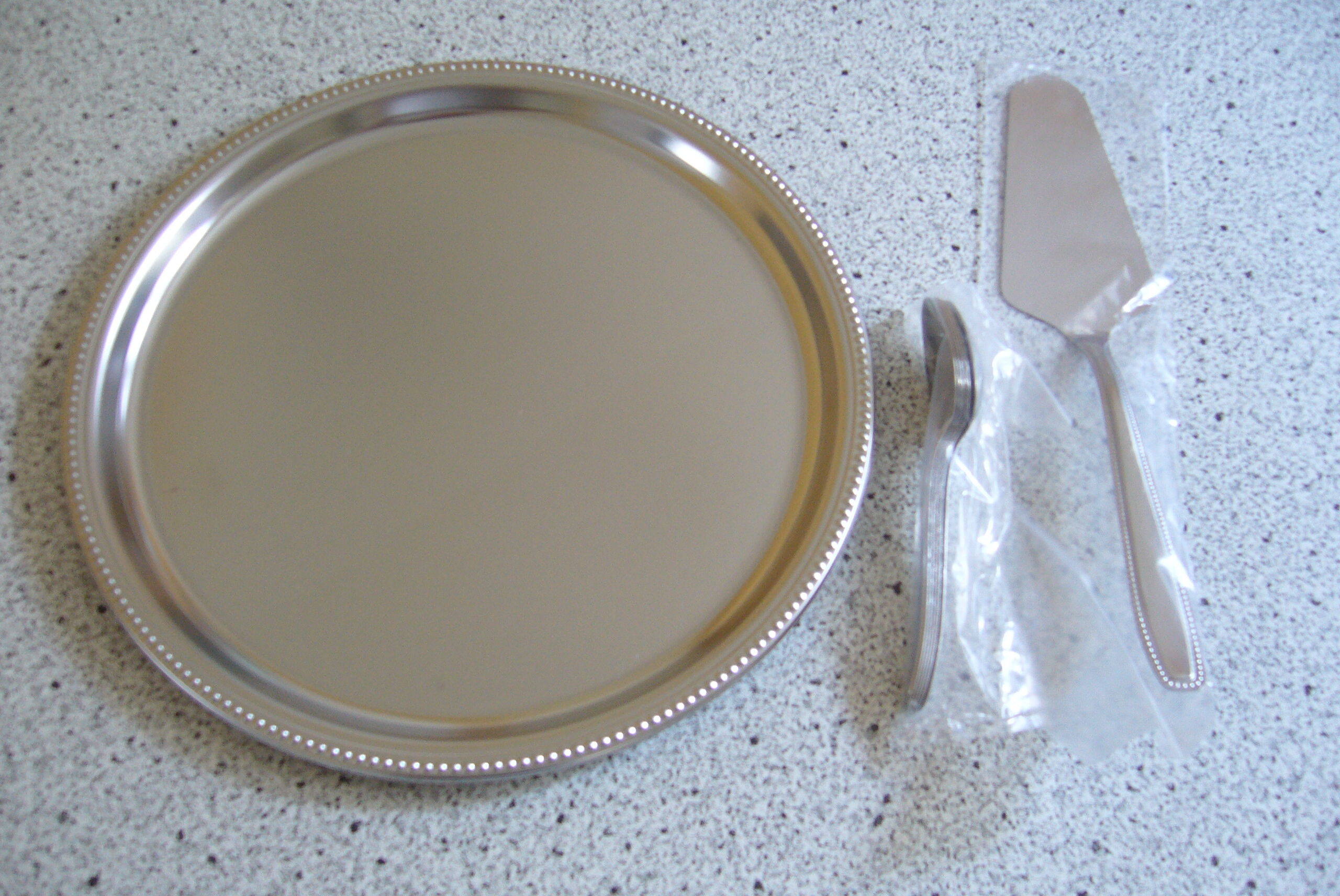 Presentation plate, cake shovel and 6 small spoons