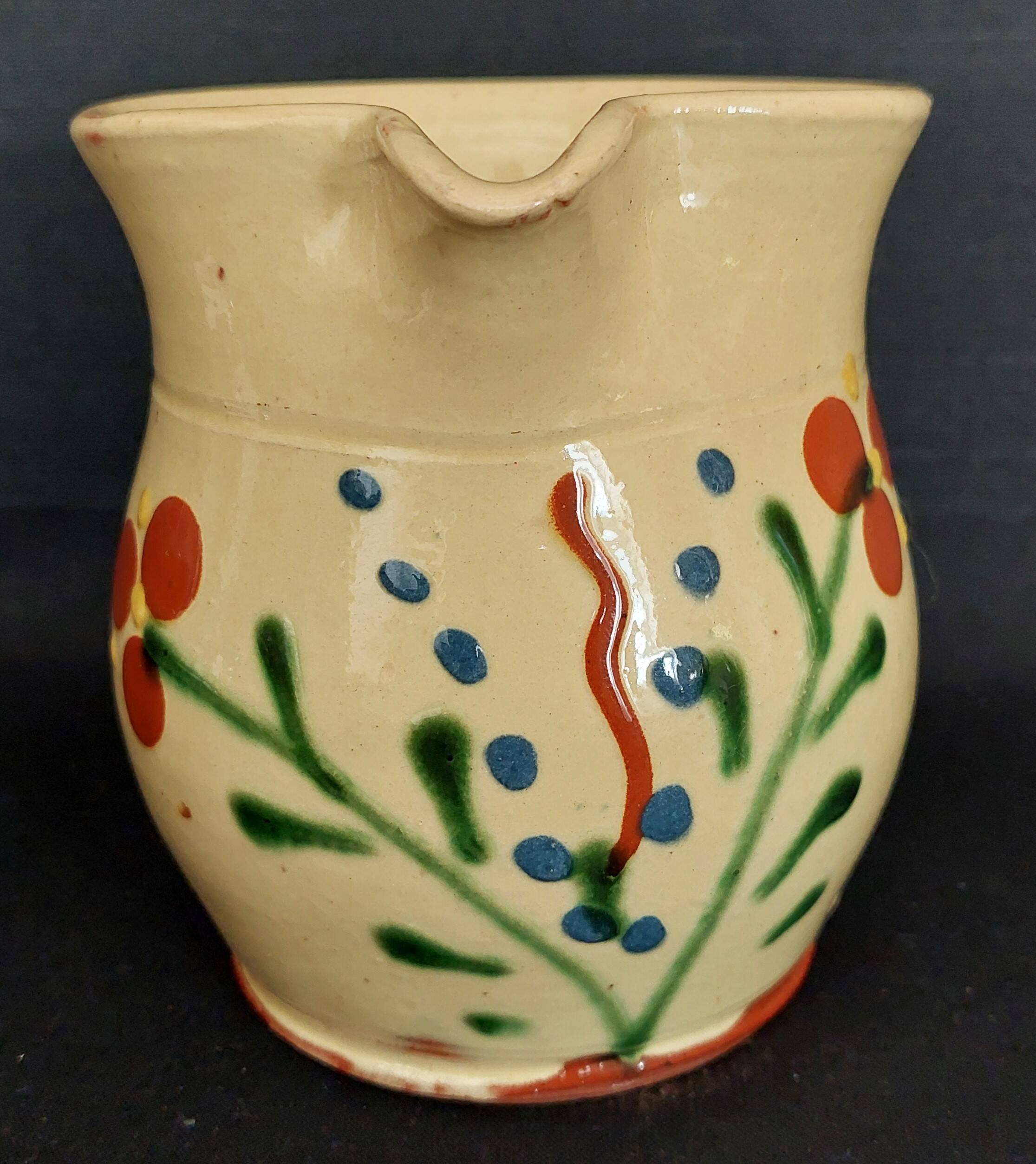 20th century Alsace glazed terracotta pitcher