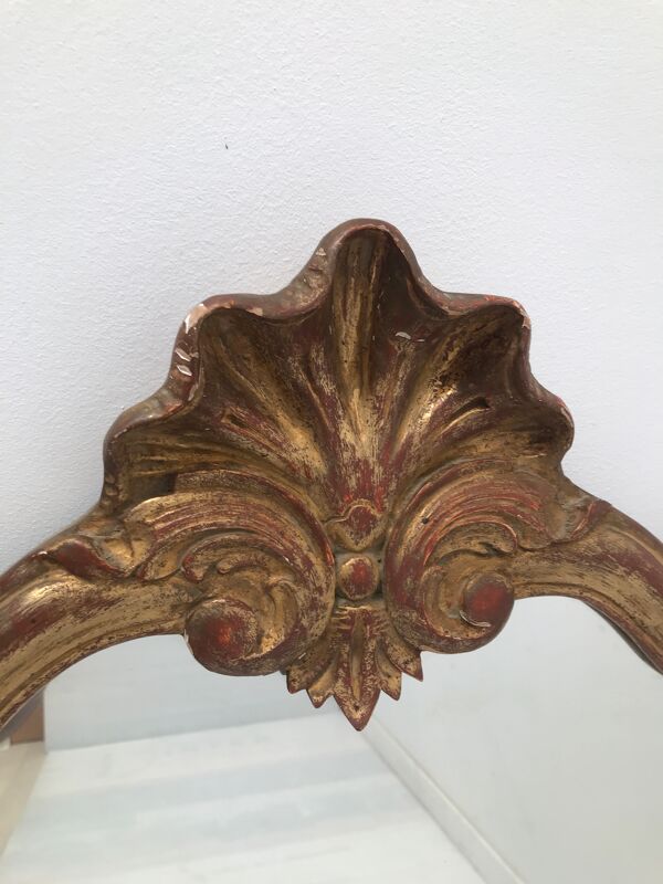 Miroir en bois doré décor coquille Louis XIV