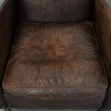 Set of two vintage sheepskin leather design armchairs in a cognac colour