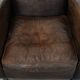 Set of two vintage sheepskin leather design armchairs in a cognac colour