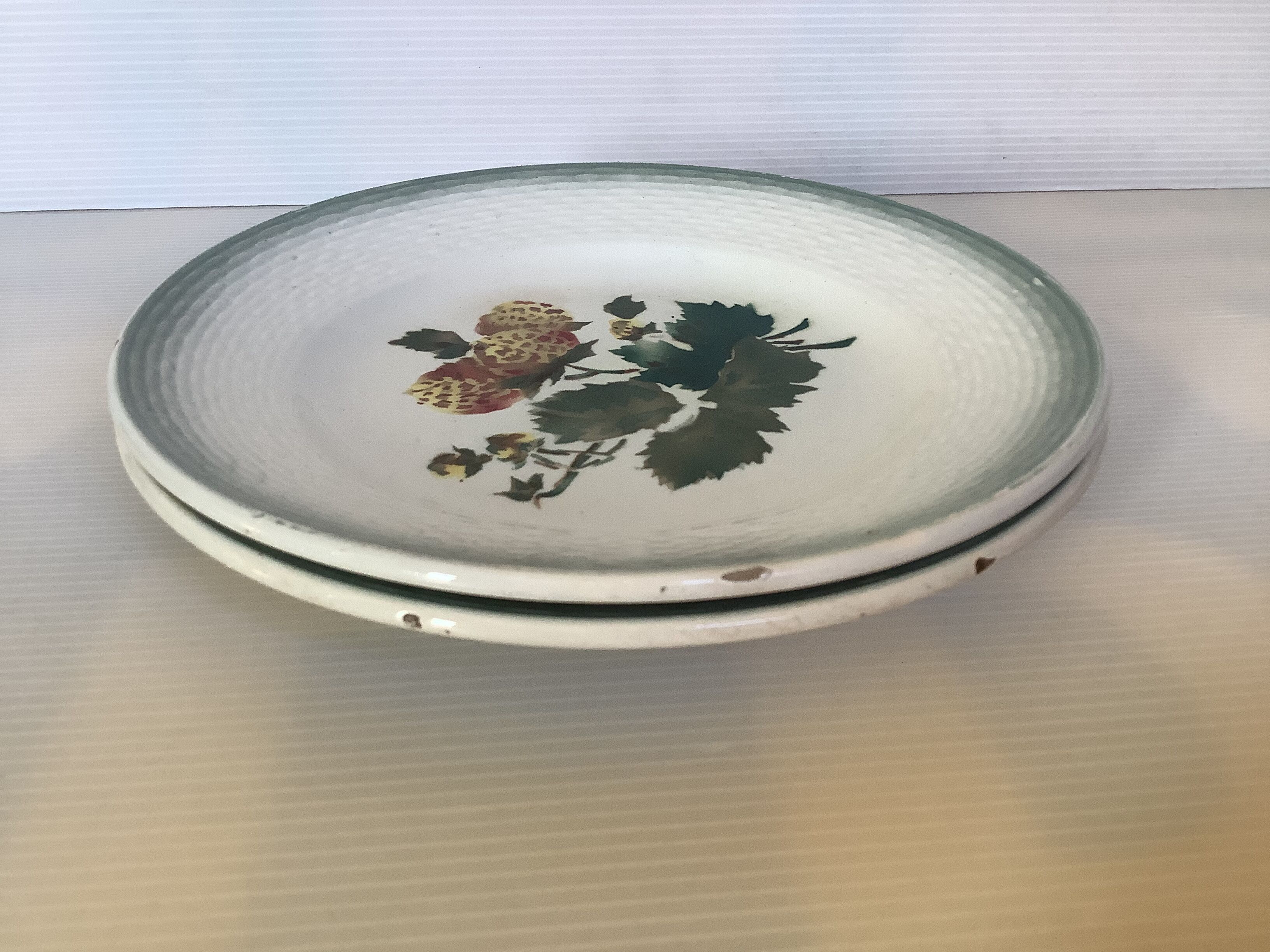 Pair of antique Saint Amand fruit plates.