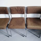 Five chairs in chromed metal and mottled fabric