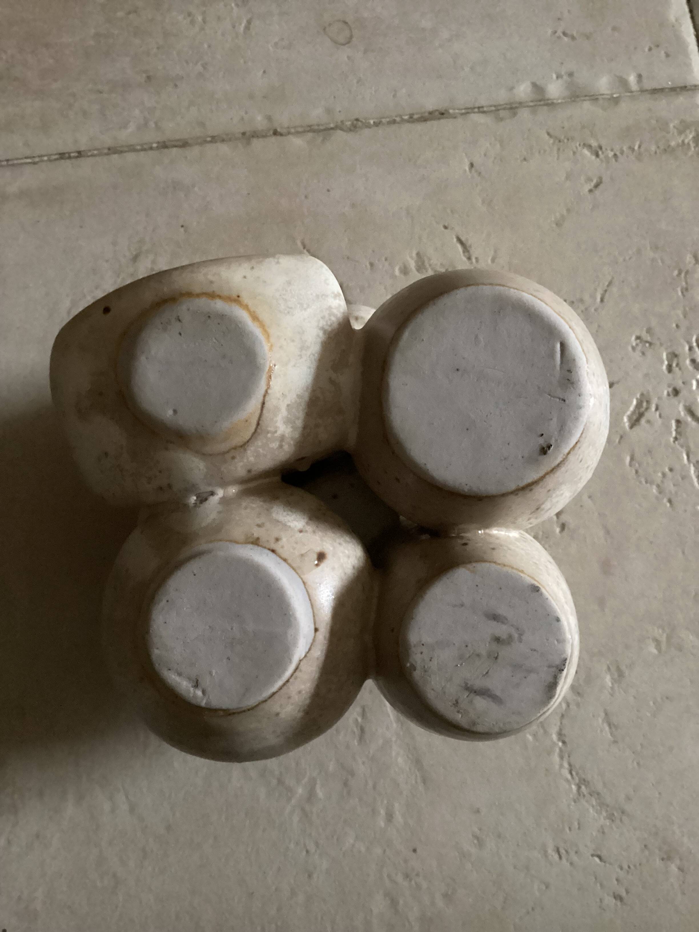 Beige ceramic flower pick