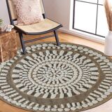 Round jute rug with white relief patterns, 90 cm