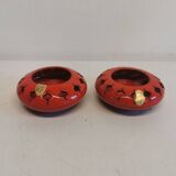 Pair of candle holders from the 1960s-1970s, crafted in red ceramic