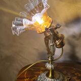 1920 bronze and brass rocking lamp with translucent amber-colored shade