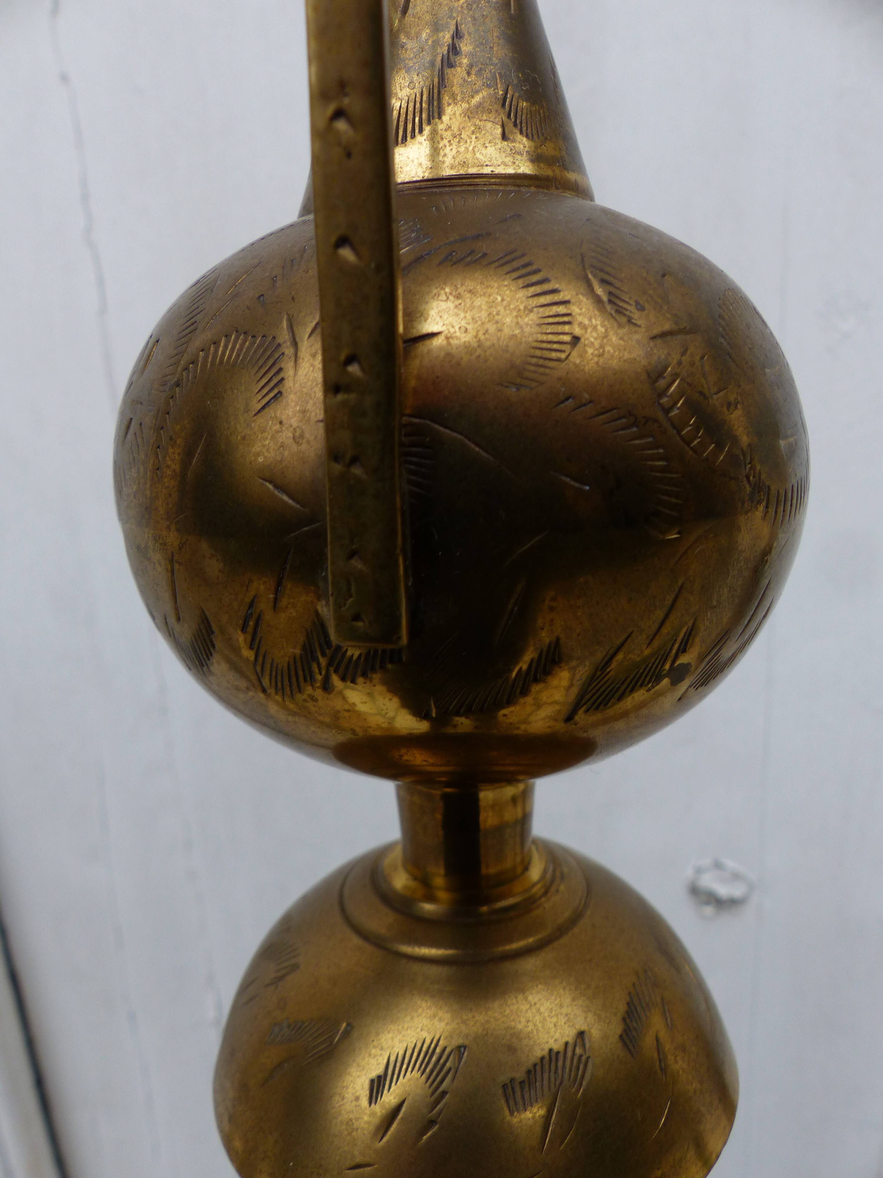 Ewer in gilded brass fully chiseled 19°