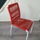 Vintage children's chair in white matel (some splinters of paint) with red scoubidou rope year 70