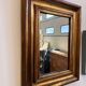 Miroir ancien en bois doré à la feuille