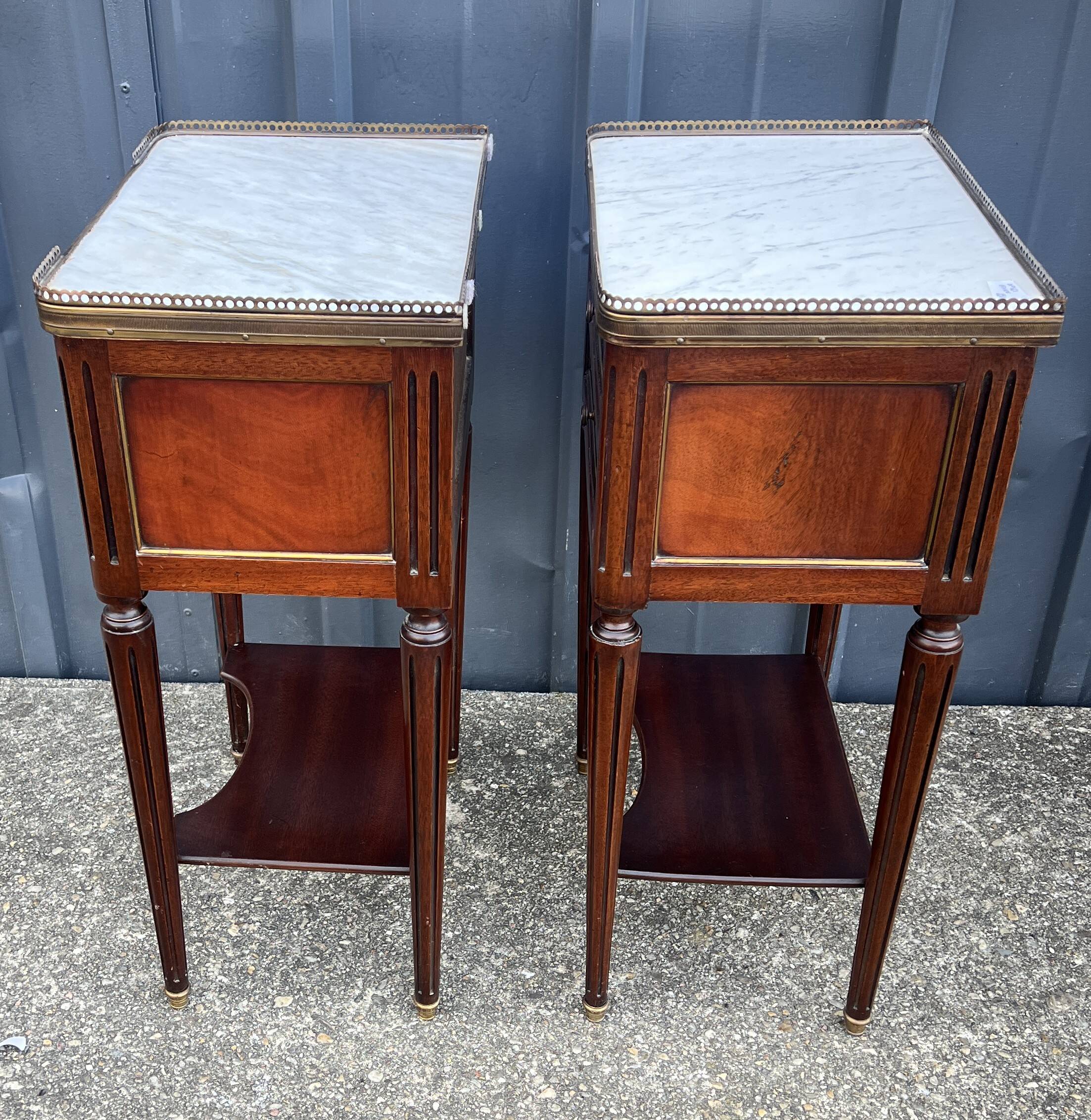 Pair of mahogany bedside tables, marble top, Louis XVI style