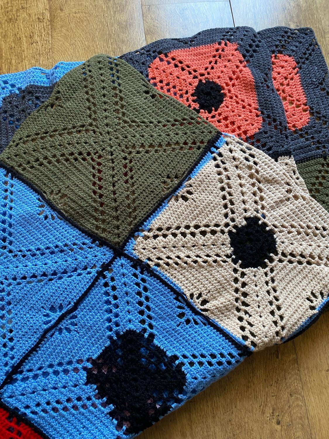 Hand-knitted patchwork blanket