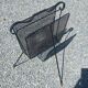 Perforated metal magazine rack from the 1960s.