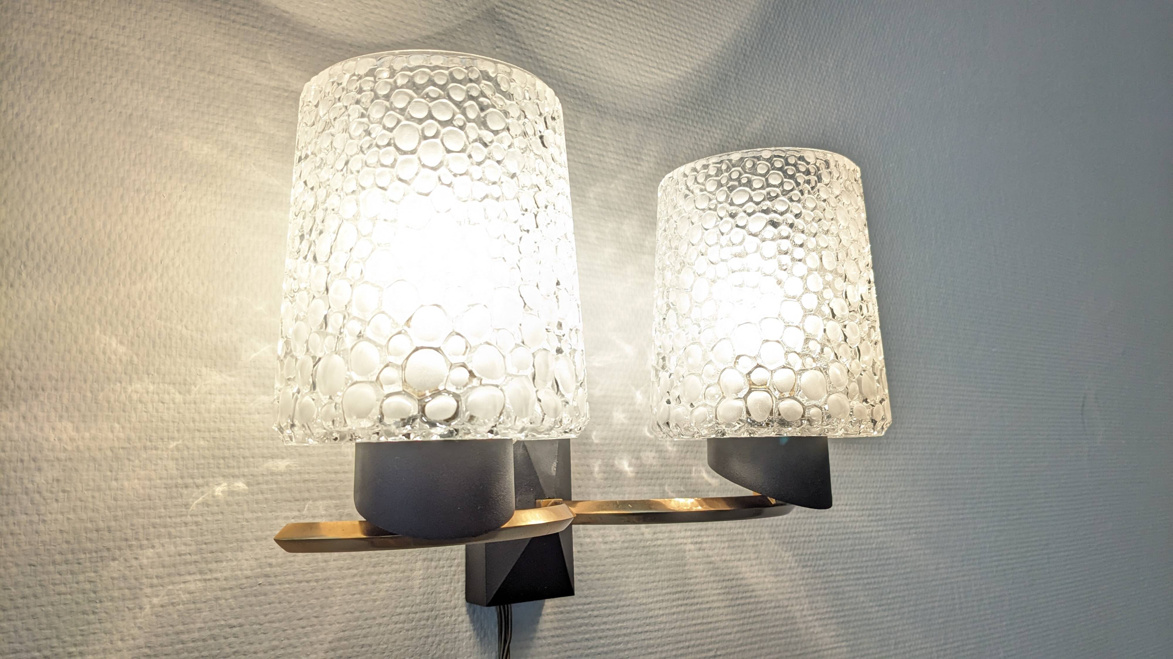 Pair of double wall lights in bubbled glass by Maison Arlus, France circa 1960.