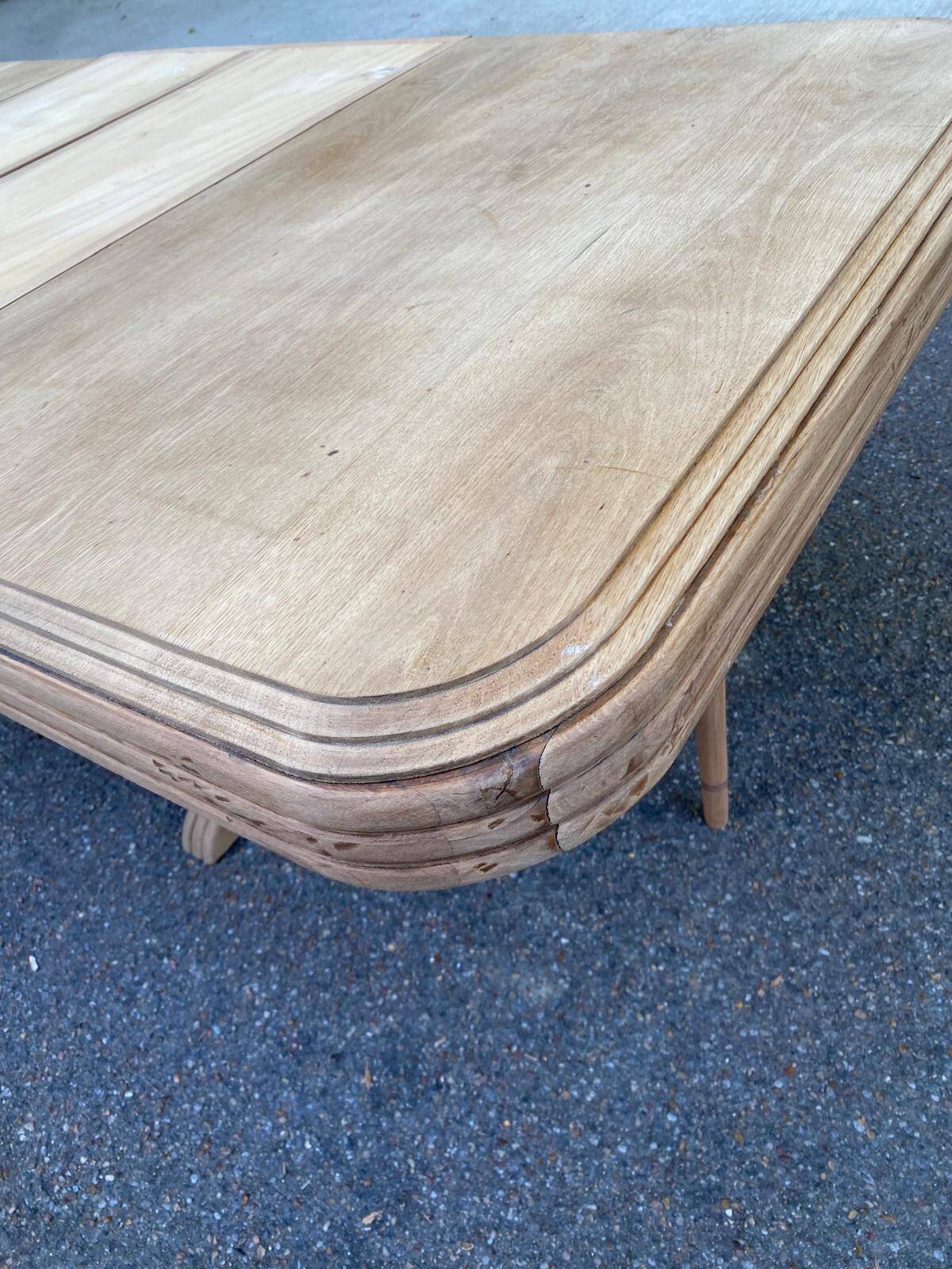 Art Deco dining table with a central pedestal, stripped in solid oak, with 2 extensions.