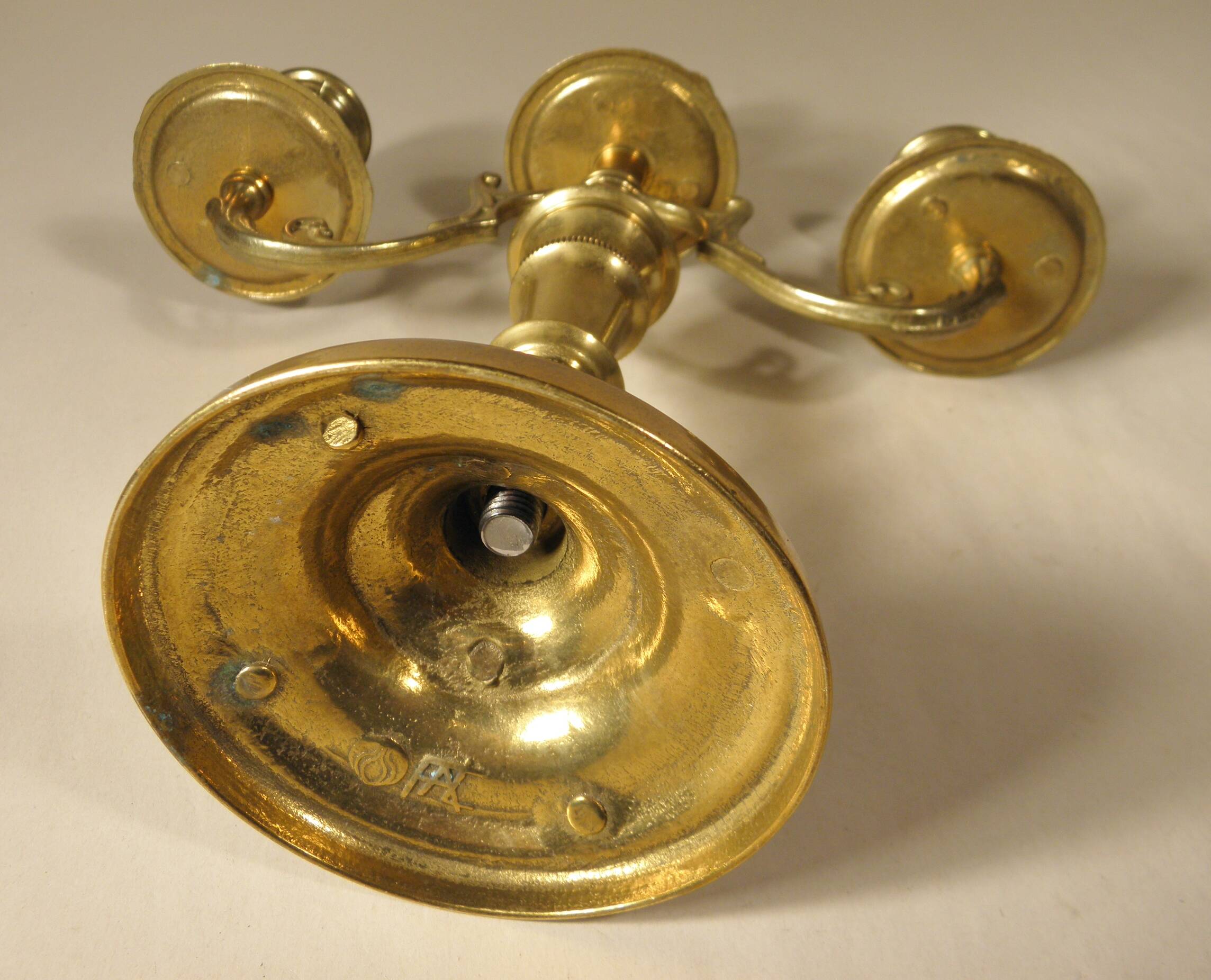 Three-light candlestick in gilded bronze