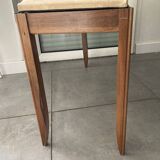 Piano bench that converts into a music book storage in excellent condition.