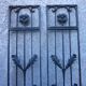 Pair of old wrought iron grid