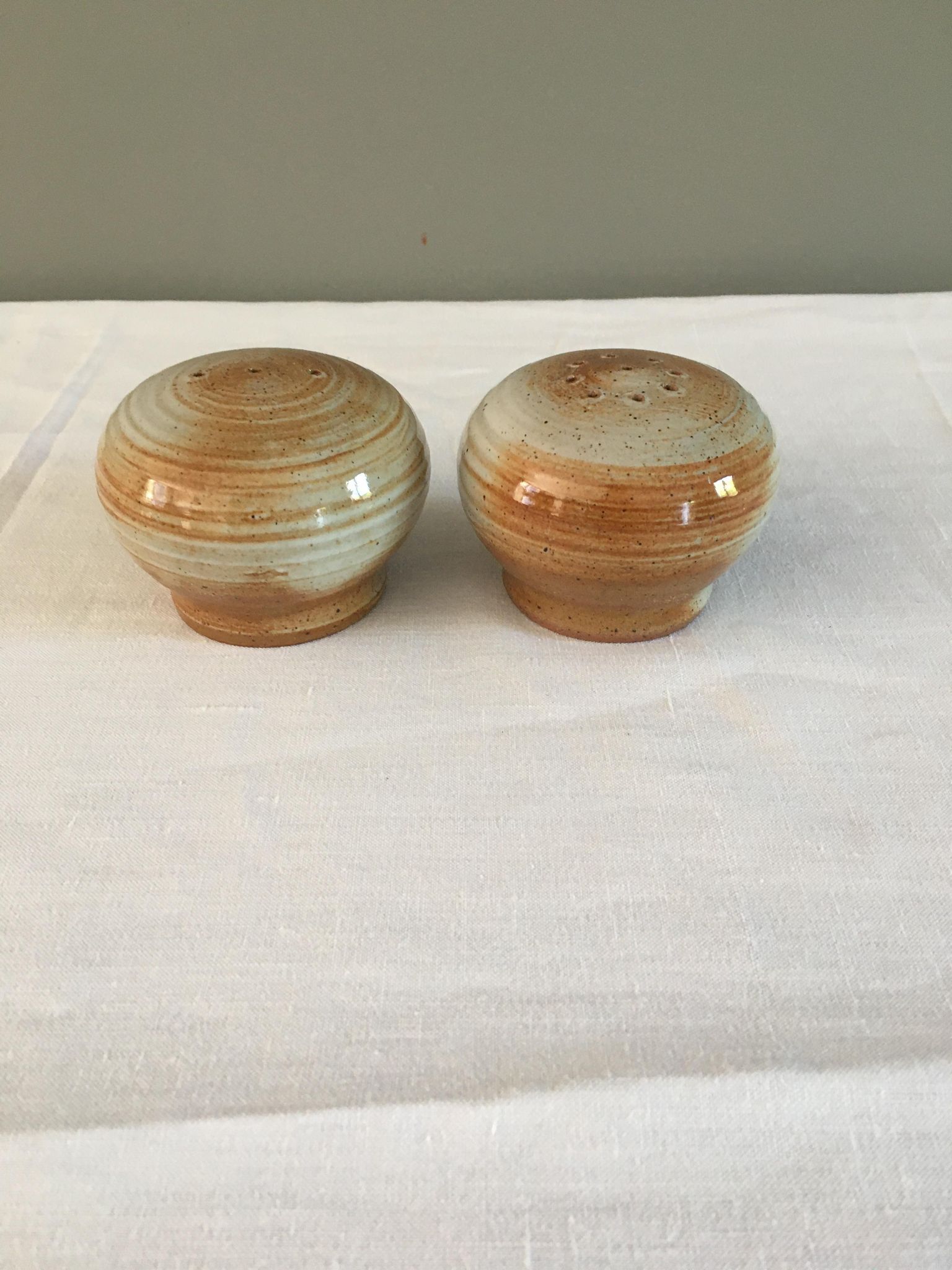 Vintage salt and pepper shaker in sandstone