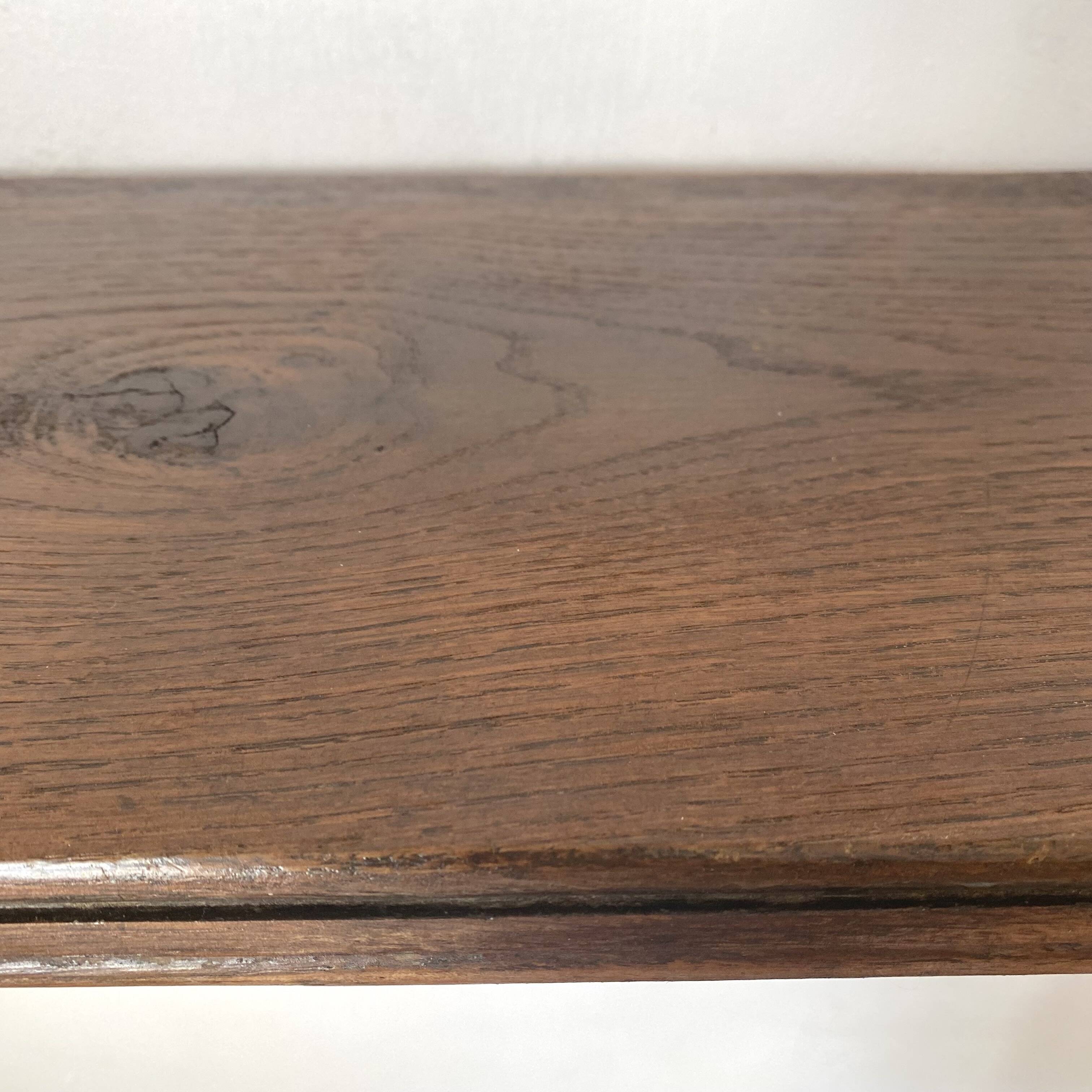 antique oak wall shelf with carved brackets