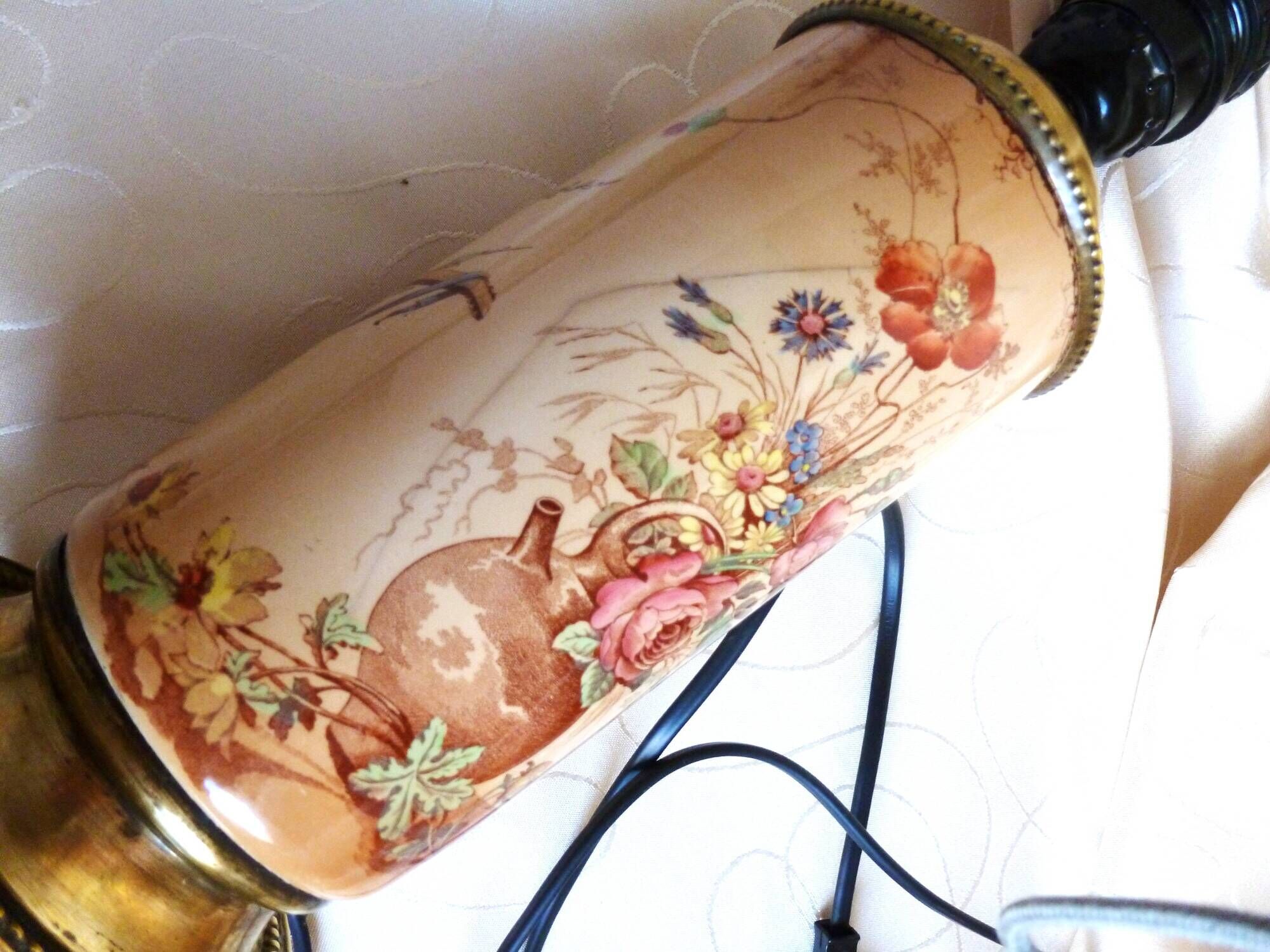 Old ceramic lamp "Lunéville" with a pig bladder shade.