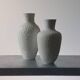 Pair of vintage biscuit porcelain vases by Metzler Ortloff.