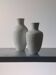 Pair of vintage biscuit porcelain vases by Metzler Ortloff.