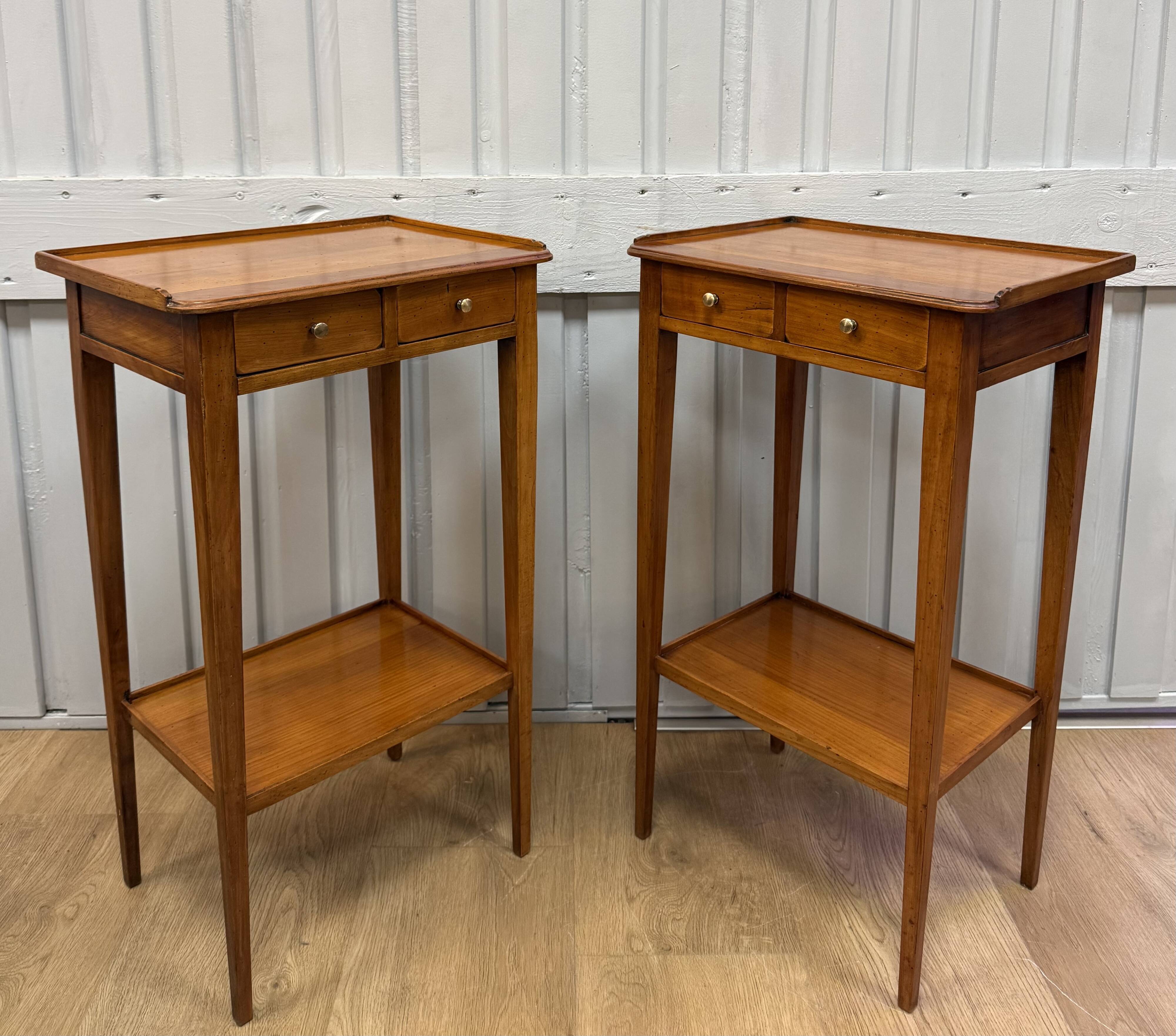 Pair of small side tables in cherry wood.