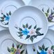 Stoneware dessert plates with floral decoration