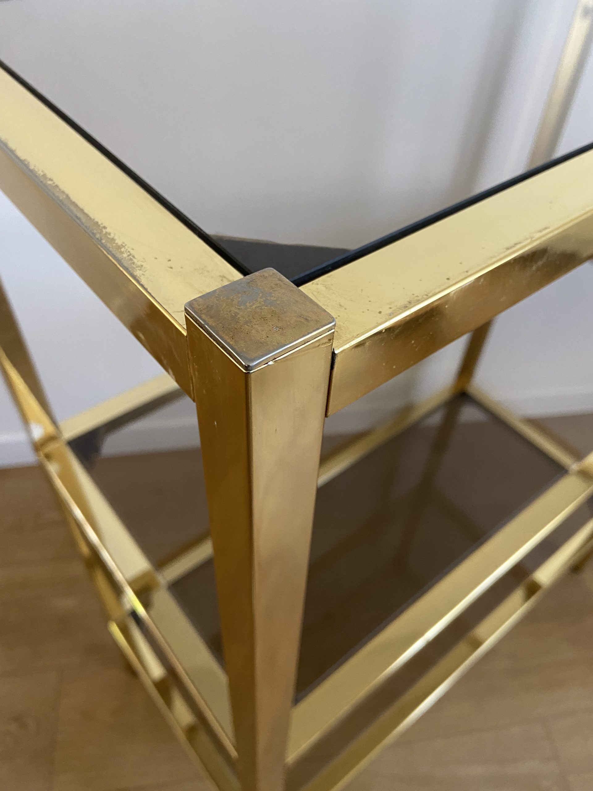 VINTAGE SHELF CONSOLE IN GOLD METAL AND SMOKED GLASS