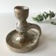 Candlestick in sandstone