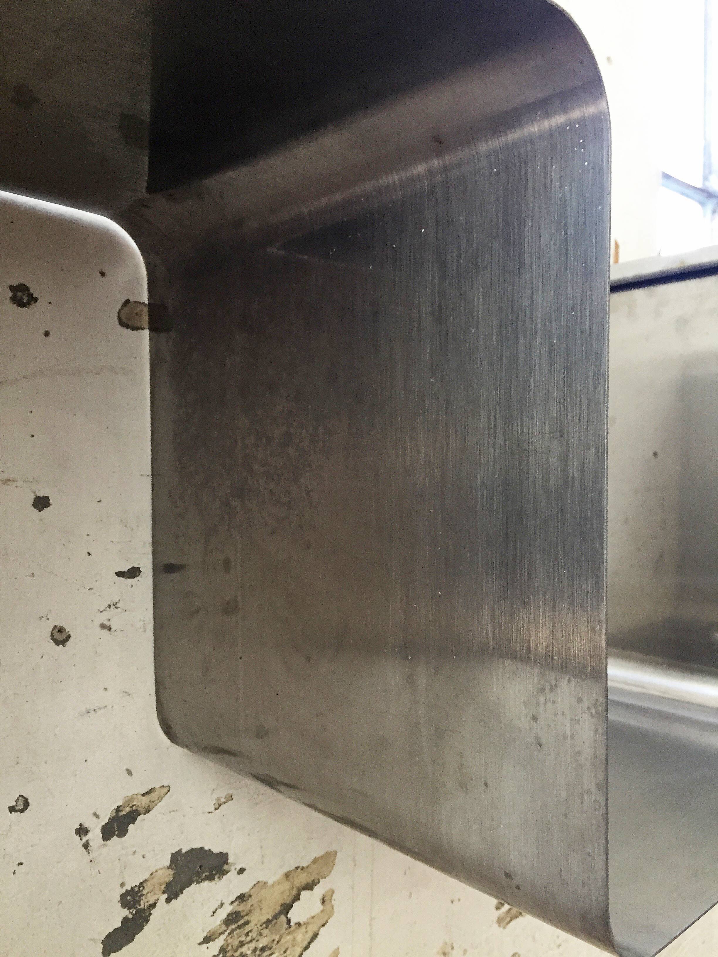 "Zig-zag" satin stainless steel shelf by Joelle Ferlande and François Monnet