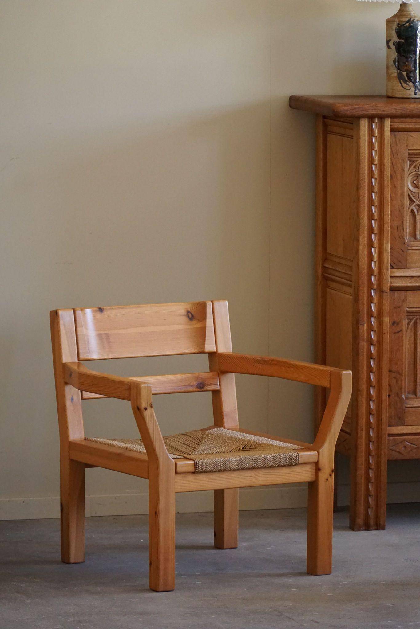 Tage Poulsen, a pair of brutalist chairs in pine and cord, Danish modern style, 1970s.