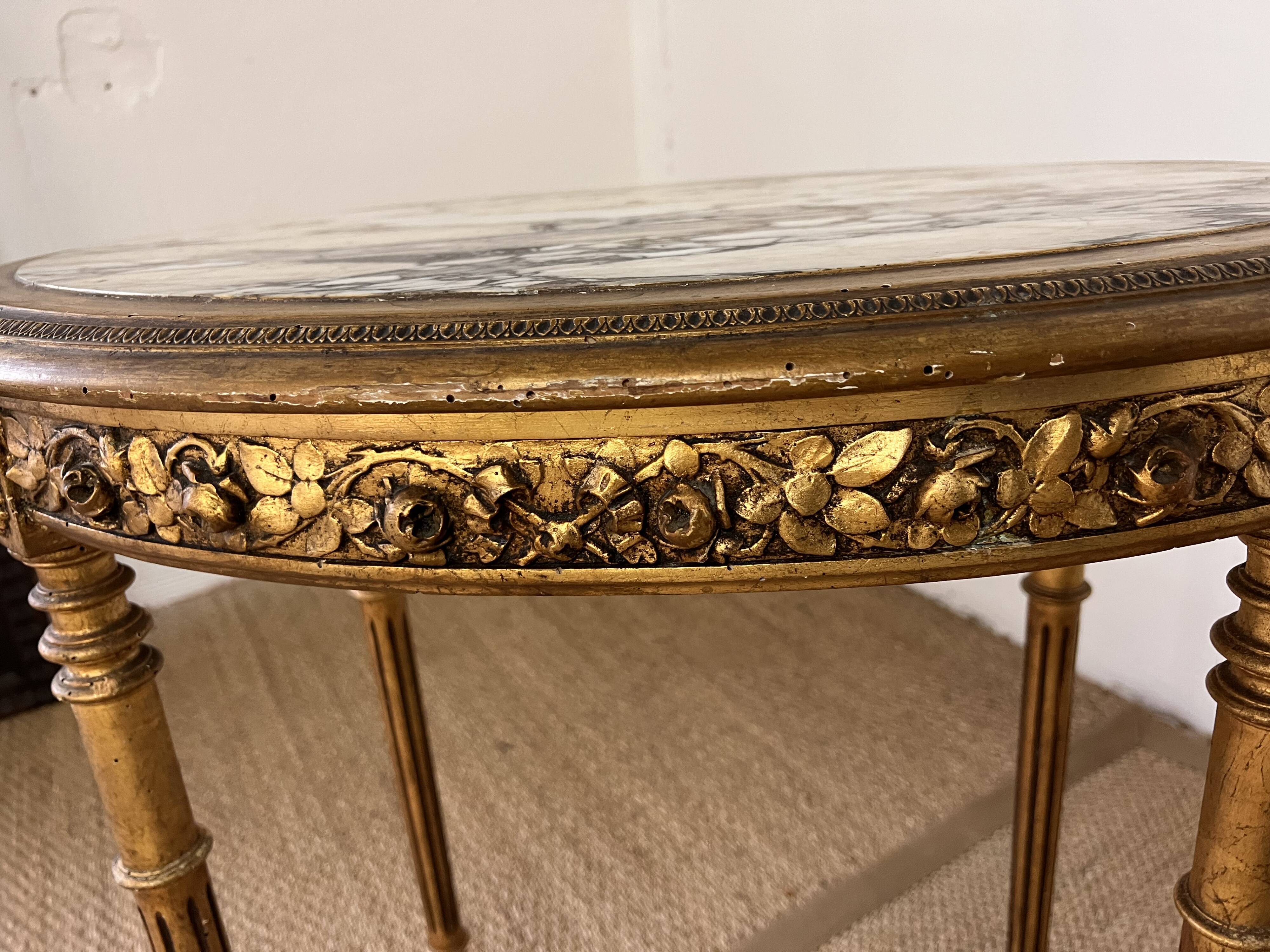 Wooden and marble pedestal table