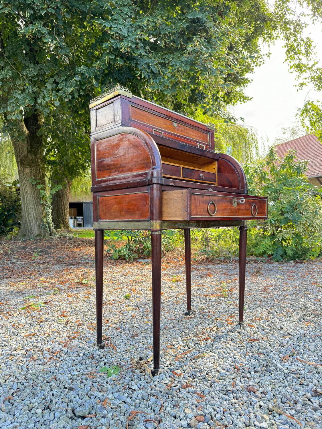 Elegant and rare Louis XVI period mahogany cylinder desk