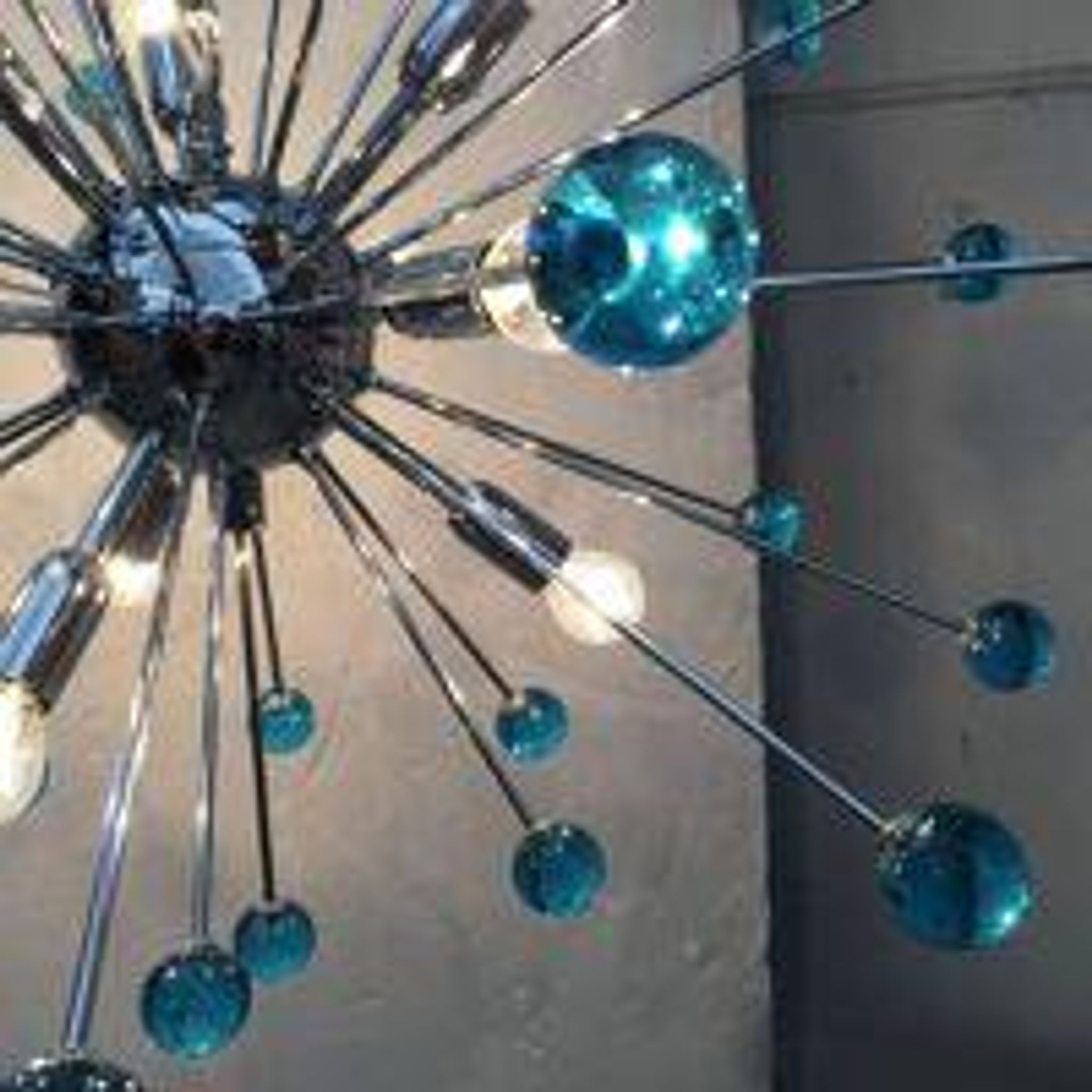 Lustre ovale spoutnik en verre de murano bleu clair « star »
