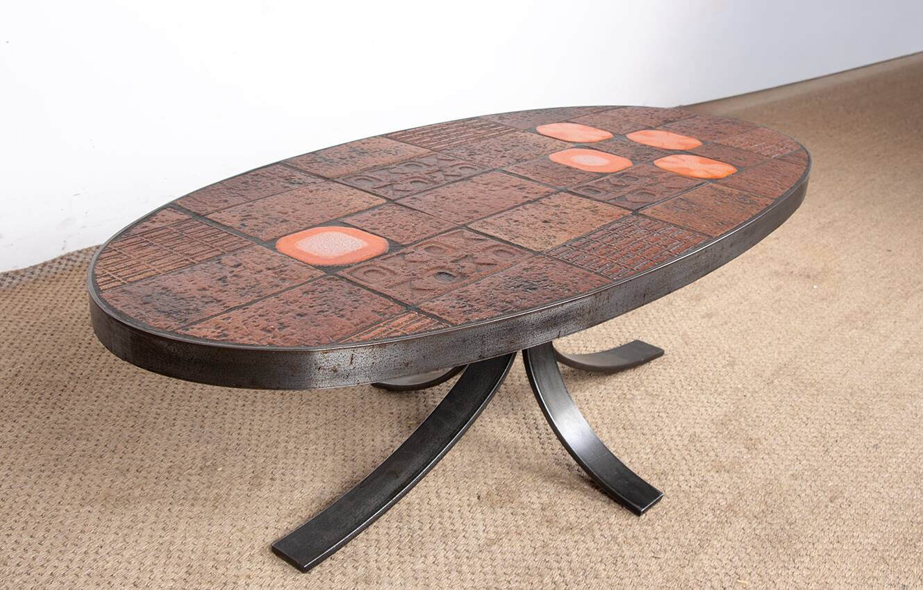 Coffee table in lava stone, ceramic and steel by Jean Jaffeux 1960.